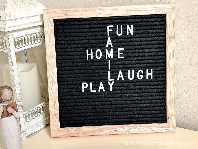 "Fun. Family. Home. Laugh. Play" Quote on letter board