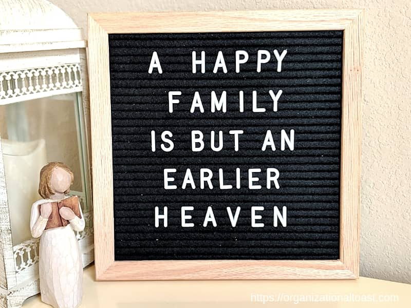 "A happy family is but an earlier heaven". Quote on letter board