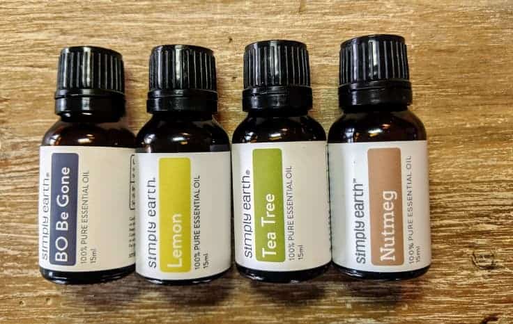 4 Simply Earth Essential Oils Bottles Lined up