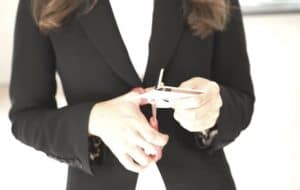 Woman cutting up credit card